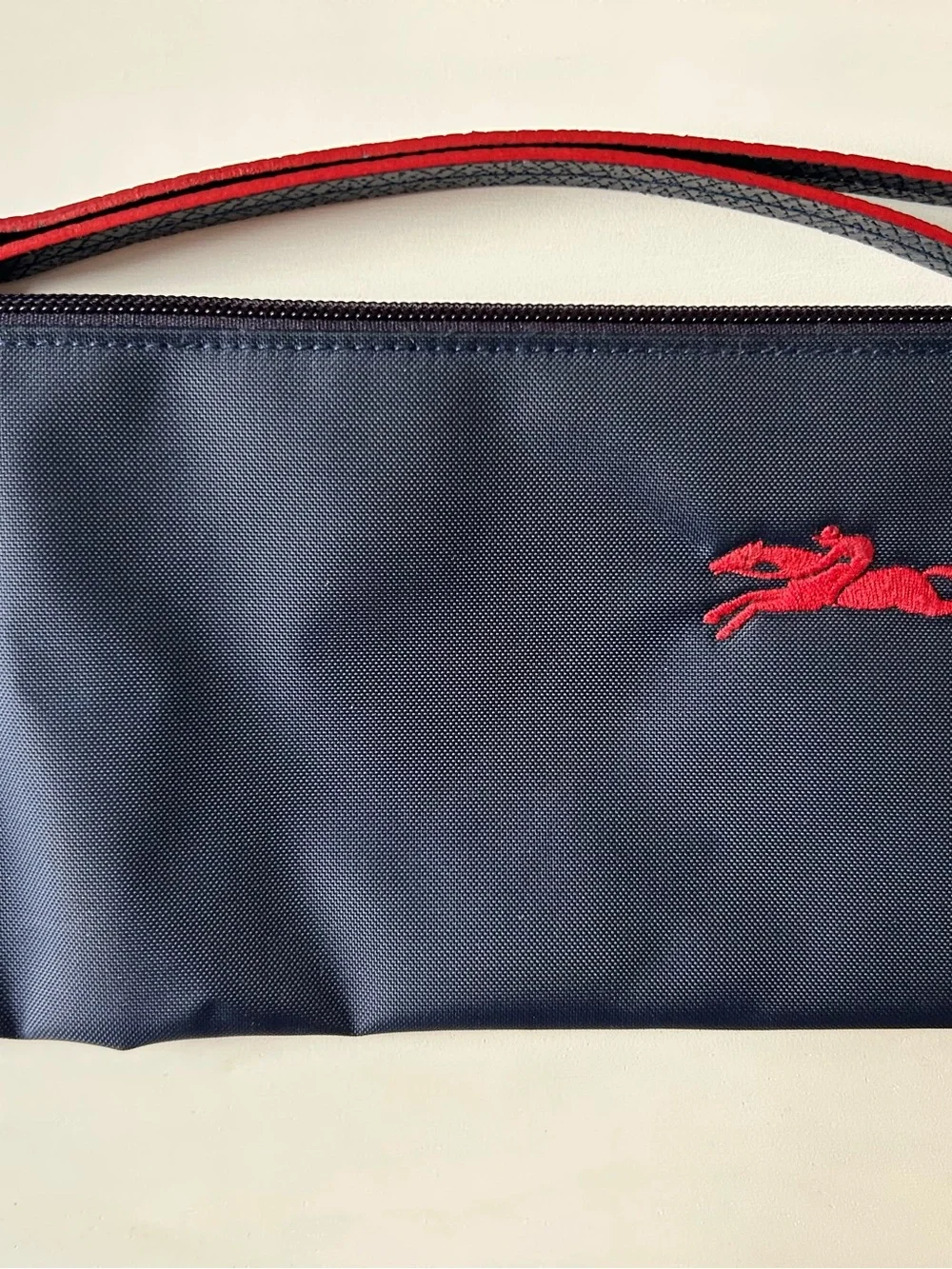 Longchamp Navy Nylon Wristlet with Red Logo
